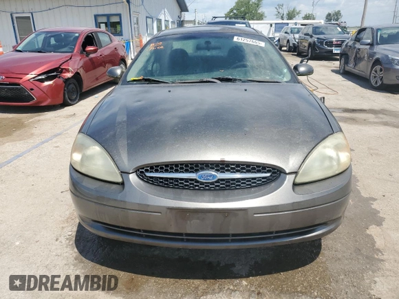 2002 Ford Taurus SES Standard with VIN 1FAFP55UX2A166740, listed as a Copart auction lot 61257665 with 170,448 mi miles and Salvage title. Bid and sale history available at DreamBid. Image 5.