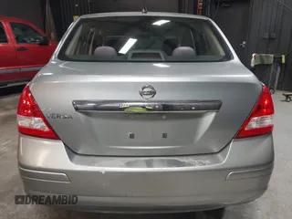 2009 Nissan Versa 1.8 S with VIN 3N1BC11EX9L396439, listed as a IAAI auction lot 42049665 with 49,617 mi miles. Bid and sale history available at carsss.com. Image 16.