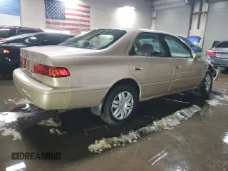 2001 Toyota Camry CE with VIN 4T1BG22KX1U772025, listed as a Copart auction lot 49718065 with 56,236 mi miles and Salvage Title. Bid and sale history available at carsss.com. Image 3.