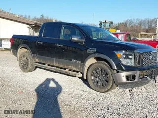 2017 Nissan Titan SV with VIN 1N6AA1E57HN516363, listed as a IAAI auction lot 41780611 with 114,749 mi miles. Bid and sale history available at carsss.com. Image 1.