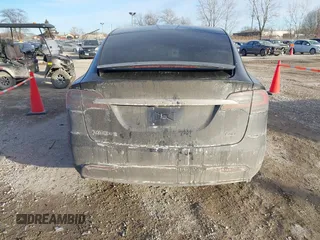 2017 Tesla Model X 90D with VIN 5YJXCDE23HF051321, listed as a IAAI auction lot 41415384 with 127,476 mi miles and . Bid and sale history available at carsss.com. Image 15.