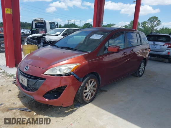 2012 Mazda 5 Sport z VIN JM1CW2BL4C0119625, wystawiony jako IAAI lot #42306364 z przebiegiem 138 906 mil mil oraz . Historia ofert i sprzedaży dostępna na DreamBid. Obrazek 2.