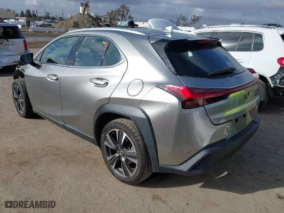 2021 Lexus UX with VIN JTHX3JBH4M2043263, listed as a IAAI auction lot 41671055 with 100,589 mi miles. Bid and sale history available at carsss.com. Image 3.