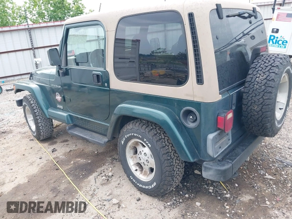 1999 Jeep Wrangler Sahara with VIN 1J4FY49S5XP482037, listed as a IAAI auction lot 42341723 with 161,081 mi miles and . Bid and sale history available at DreamBid. Image 3.
