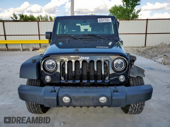 2015 Jeep Wrangler Freedom Edition with VIN 1C4AJWAG8FL541675, listed as a Copart auction lot 62647855 with 53,915 mi miles and Salvage title. Bid and sale history available at DreamBid. Image 5.