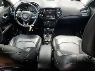 2020 Jeep Compass Limited with VIN 3C4NJCCB1LT231188, listed as a Copart auction lot 57659365 with 77,929 mi miles and Salvage title. Bid and sale history available at DreamBid. Image 8.
