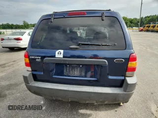 2003 Ford Escape XLT Popular with VIN 1FMCU03123KA03878, listed as a Copart auction lot 60133485 with 298,100 mi miles and Salvage title. Bid and sale history available at DreamBid. Image 6.