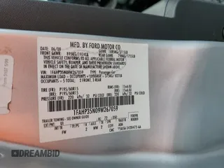 2009 Ford Focus SE with VIN 1FAHP35N09W267059, listed as a Copart auction lot 54155965 with 129,768 mi miles and Salvage Title. Bid and sale history available at carsss.com. Image 13.