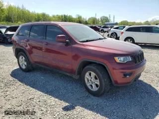 2017 Jeep Grand Cherokee Laredo with VIN 1C4RJEAG4HC674871, listed as a Copart auction lot 52828515 with 121,824 mi miles and Clean Title. Bid and sale history available at carsss.com. Image 4.