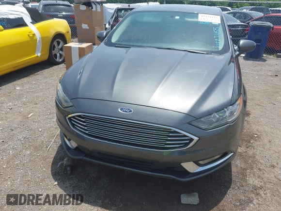 2017 Ford Fusion SE z VIN 3FA6P0HD3HR189144, wystawiony jako IAAI lot #42271155 z przebiegiem 172 146 mil mil oraz . Historia ofert i sprzedaży dostępna na DreamBid. Obrazek 6.