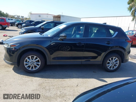 2023 Mazda CX-5 2.5 S with VIN JM3KFBAM5P0291312, listed as a IAAI auction lot 41957929 with 19,000 mi miles. Bid and sale history available at carsss.com. Image 15.