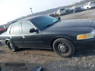 2006 Ford Police Interceptor z VIN 2FAHP71W76X142677, wystawiony jako IAAI lot #41173196 z przebiegiem 152 236 mil mil oraz . Historia ofert i sprzedaży dostępna na DreamBid. Obrazek 13.