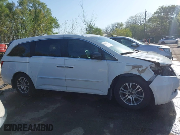 2012 Honda Odyssey EX-L with VIN 5FNRL5H62CB010054, listed as a IAAI auction lot 42040117 with 189,566 mi miles and . Bid and sale history available at carsss.com. Image 14.