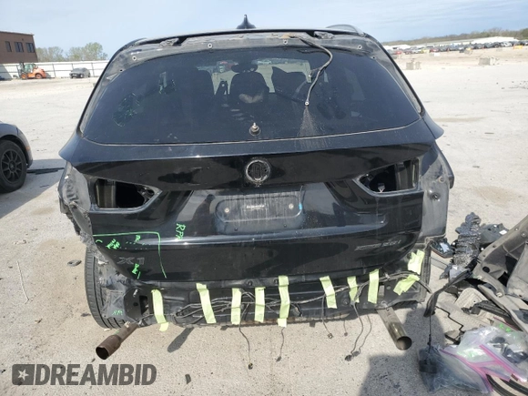 2020 BMW X1 xDrive28i with VIN WBXJG9C06L5P89796, listed as a Copart auction lot 52817235 with 95,665 mi miles and Salvage title. Bid and sale history available at DreamBid. Image 6.