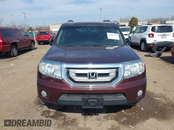 2009 Honda Pilot EX-L with VIN 5FNYF48639B020937, listed as a IAAI auction lot 41804771 with 226,668 mi miles and . Bid and sale history available at carsss.com. Image 12.