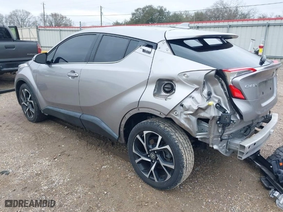 2019 Toyota C-HR XLE with VIN NMTKHMBX0KR082023, listed as a IAAI auction lot 41606867 with 52,814 mi miles. Bid and sale history available at carsss.com. Image 3.