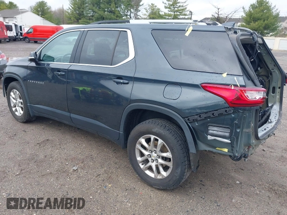 2018 Chevrolet Traverse LT Cloth z VIN 1GNEVGKW7JJ156198, wystawiony jako IAAI lot #41909259 z przebiegiem 82 719 mil mil oraz . Historia ofert i sprzedaży dostępna na DreamBid. Obrazek 3.