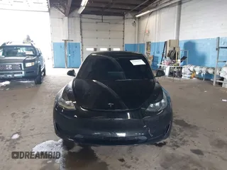2023 Tesla Model 3 with VIN 5YJ3E1EA5PF396413, listed as a IAAI auction lot 42188639 with 57,717 mi miles and . Bid and sale history available at DreamBid. Image 12.