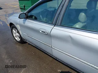 2002 Mercury Sable LS Premium with VIN 1MEFM55S52A600384, listed as a IAAI auction lot 41960299 with 215,998 mi miles and . Bid and sale history available at DreamBid. Image 6.