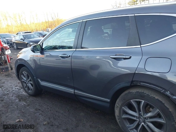 2022 Honda CR-V Hybrid Touring with VIN 5J6RT6H9XNL038288, listed as a IAAI auction lot 40955705 with 61,153 mi miles. Bid and sale history available at carsss.com. Image 14.