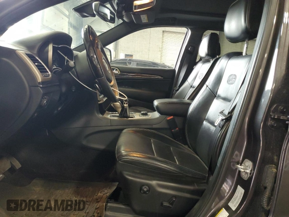 2016 Jeep Grand Cherokee Overland with VIN 1C4RJFCG9GC345309, listed as a Copart auction lot 61095285 with 115,968 mi miles and Salvage title. Bid and sale history available at DreamBid. Image 7.