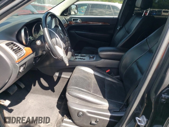 2011 Jeep Grand Cherokee Limited with VIN 1J4RR5GT2BC677640, listed as a Copart auction lot 68012754 with 138,208 mi miles and Salvage title. Bid and sale history available at DreamBid. Image 7.