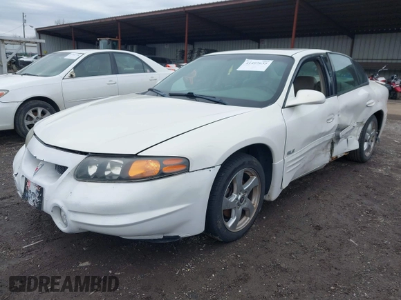 2004 Pontiac Bonneville SLE z VIN 1G2HY52K54U215710, wystawiony jako IAAI lot #41497635 z przebiegiem 123 343 mil mil oraz . Historia ofert i sprzedaży dostępna na DreamBid. Obrazek 2.