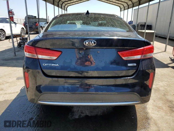2018 Kia Optima Hybrid Premium with VIN KNAGT4LE3J5023262, listed as a Copart auction lot 65211244 with 142,212 mi miles and Salvage Title. Bid and sale history available at carsss.com. Image 6.