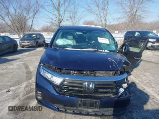2024 Honda Odyssey EX-L with VIN 5FNRL6H60RB061017, listed as a IAAI auction lot 41399491 with 6,921 mi miles and . Bid and sale history available at DreamBid. Image 12.