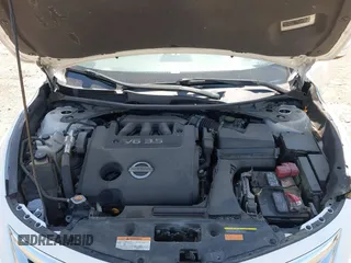 2015 Nissan Altima SL z VIN 1N4BL3AP2FC571645, wystawiony jako IAAI lot #42095010 z przebiegiem 124 881 mil mil oraz . Historia ofert i sprzedaży dostępna na DreamBid. Obrazek 10.