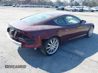 2005 Aston Martin DB9 z VIN SCFAD01A75GA01262, wystawiony jako IAAI lot #41937486 z przebiegiem 35 538 mil mil oraz . Historia ofert i sprzedaży dostępna na DreamBid. Obrazek 4.