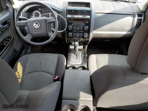 2010 Mazda Tribute Touring with VIN 4F2CY9C75AKM02945, listed as a Copart auction lot 67784674 with 134,363 mi miles and Salvage Title. Bid and sale history available at carsss.com. Image 8.