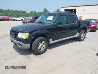 2003 Ford Explorer Sport Trac XLS z VIN 1FMZU77EX3UA50273, wystawiony jako IAAI lot #42406881 z przebiegiem 217 961 mil mil oraz . Historia ofert i sprzedaży dostępna na DreamBid. Obrazek 2.