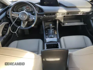 2022 Mazda 3 2.5 Turbo с VIN 3MZBPBAY9NM306877, выставлен на аукционе Copart как лот 87252804 с пробегом 21 724 миль миль и Списание • Salvage title. История ставок и продаж доступна на DreamBid. Изображение 8.