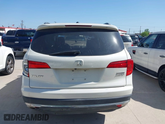 2016 Honda Pilot Touring with VIN 5FNYF6H97GB088824, listed as a IAAI auction lot 41991803 with 84,761 mi miles. Bid and sale history available at carsss.com. Image 17.
