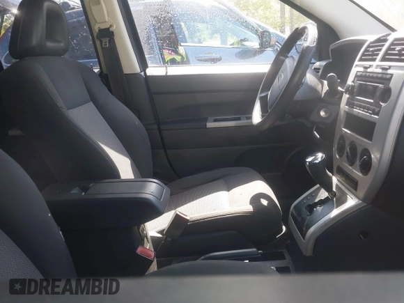 2008 Jeep Compass Sport with VIN 1J8FF47WX8D758998, listed as a IAAI auction lot 42061944 with 271,977 mi miles and . Bid and sale history available at carsss.com. Image 5.