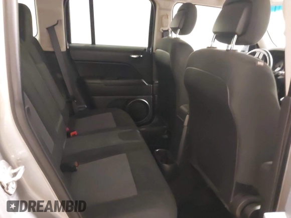 2016 Jeep Patriot Latitude with VIN 1C4NJRFB0GD581213, listed as a IAAI auction lot 42407888 with 104,202 mi miles and . Bid and sale history available at DreamBid. Image 8.