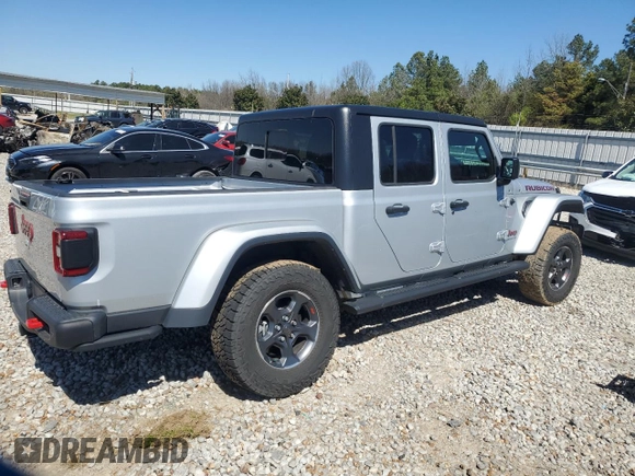 2023 Jeep Gladiator Rubicon with VIN 1C6JJTBG6PL579895, listed as a Copart auction lot 49588395 with 22,066 mi miles and Salvage title. Bid and sale history available at DreamBid. Image 3.
