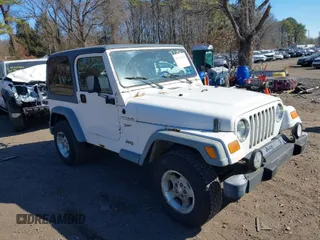 2002 Jeep Wrangler Sport with VIN 1J4FA49S22P742228, listed as a IAAI auction lot 41753922 with 226,408 mi miles. Bid and sale history available at carsss.com. Image 1.