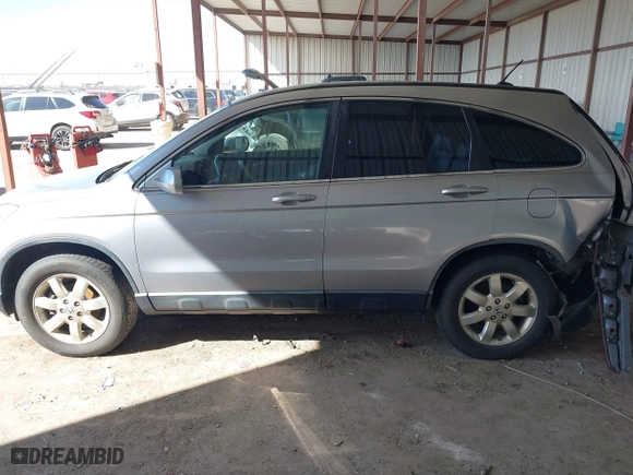2007 Honda CR-V EX-L with VIN JHLRE387X7C069804, listed as a IAAI auction lot 41616256 with 136,271 mi miles. Bid and sale history available at carsss.com. Image 15.