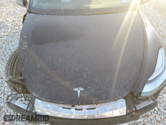 2023 Tesla Model Y Long Range z VIN 7SAYGDEE1PA078373, wystawiony jako Copart lot #48169175 z przebiegiem Nie podano mil oraz Szkoda całkowita • Salvage title. Historia ofert i sprzedaży dostępna na DreamBid. Obrazek 13.