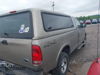 2001 Ford F-150 XL with VIN 1FTRF18W11NA61110, listed as a IAAI auction lot 42288546 with Not provided miles and . Bid and sale history available at DreamBid. Image 4.