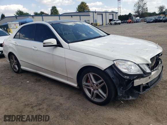 2011 Mercedes-Benz E 550 Luxury with VIN WDDHF9AB3BA444871, listed as a Copart auction lot 74978934 with 186,659 mi miles and Salvage title. Bid and sale history available at DreamBid. Image 4.