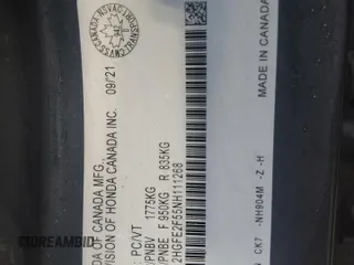2022 Honda Civic Sport z VIN 2HGFE2F55NH111268, wystawiony jako Copart lot #57655735 z przebiegiem Nie podano mil oraz Szkoda całkowita • Salvage title. Historia ofert i sprzedaży dostępna na DreamBid. Obrazek 12.