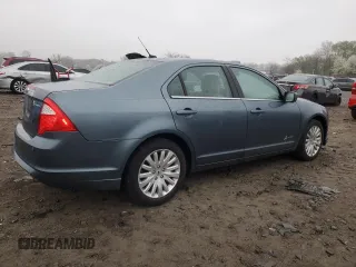 2012 Ford Fusion Hybrid z VIN 3FADP0L35CR425873, wystawiony jako Copart lot #50870905 z przebiegiem 75 133 mil mil oraz Szkoda całkowita • Salvage title. Historia ofert i sprzedaży dostępna na DreamBid. Obrazek 3.