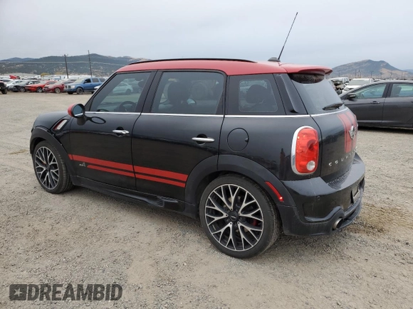 2016 MINI Countryman John Cooper Works with VIN WMWXD1C53GWS95325, listed as a Copart auction lot 77540424 with 98,951 mi miles and Salvage Title. Bid and sale history available at DreamBid. Image 2.