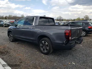 2019 Honda Ridgeline RTL-E with VIN 5FPYK3F7XKB020903, listed as a Copart auction lot 52882845 with 85,746 mi miles and Salvage Title. Bid and sale history available at carsss.com. Image 2.