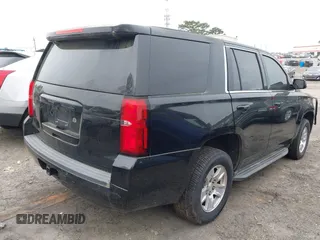 2017 Chevrolet Tahoe Commercial with VIN 1GNLCDECXHR306698, listed as a IAAI auction lot 41924208 with 177,837 mi miles and . Bid and sale history available at DreamBid. Image 4.