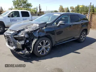 2018 Lexus RX 450hL Premium with VIN JTJDGKCAXJ2000538, listed as a Copart auction lot 61776195 with 74,988 mi miles and Salvage title. Bid and sale history available at DreamBid. Image 1.