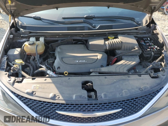 2017 Chrysler Pacifica Touring with VIN 2C4RC1DG1HR536856, listed as a Copart auction lot 58973155 with 142,520 mi miles and Salvage title. Bid and sale history available at DreamBid. Image 12.